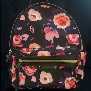 Juicy Couture backpack. Super roomy inside. Super cute.